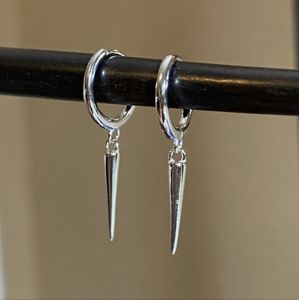 Dangling spike earrings